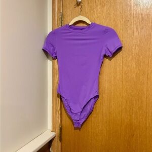 SKIMS Bodysuit in Vibrant Purple